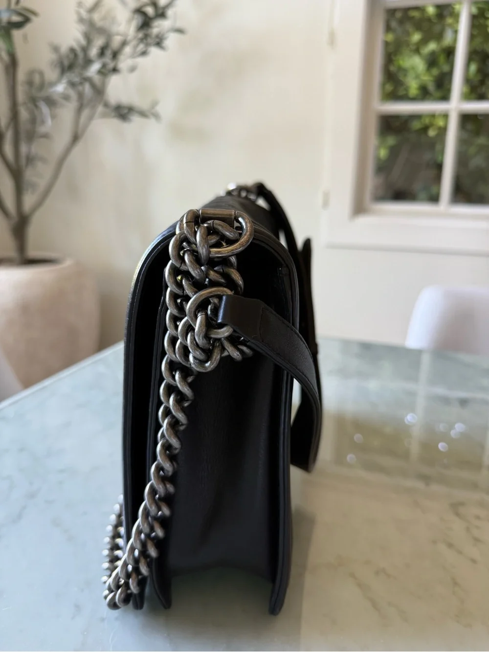 CHANEL Black Quilted Boy Flap Shoulder Bag with Silver Chain
